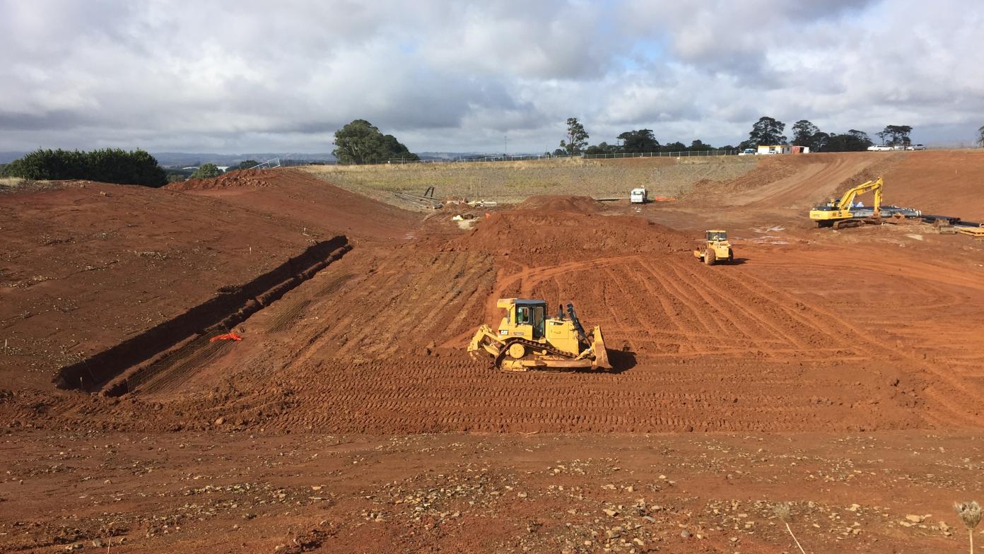 Trucks constructing the Drouin water storage. 