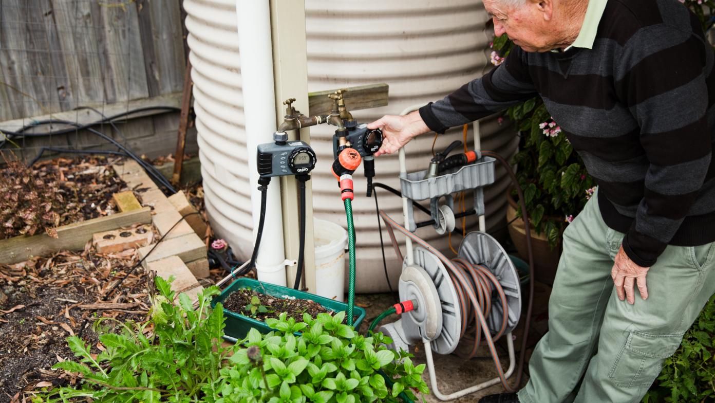 A customer using a water-efficient garden set up.