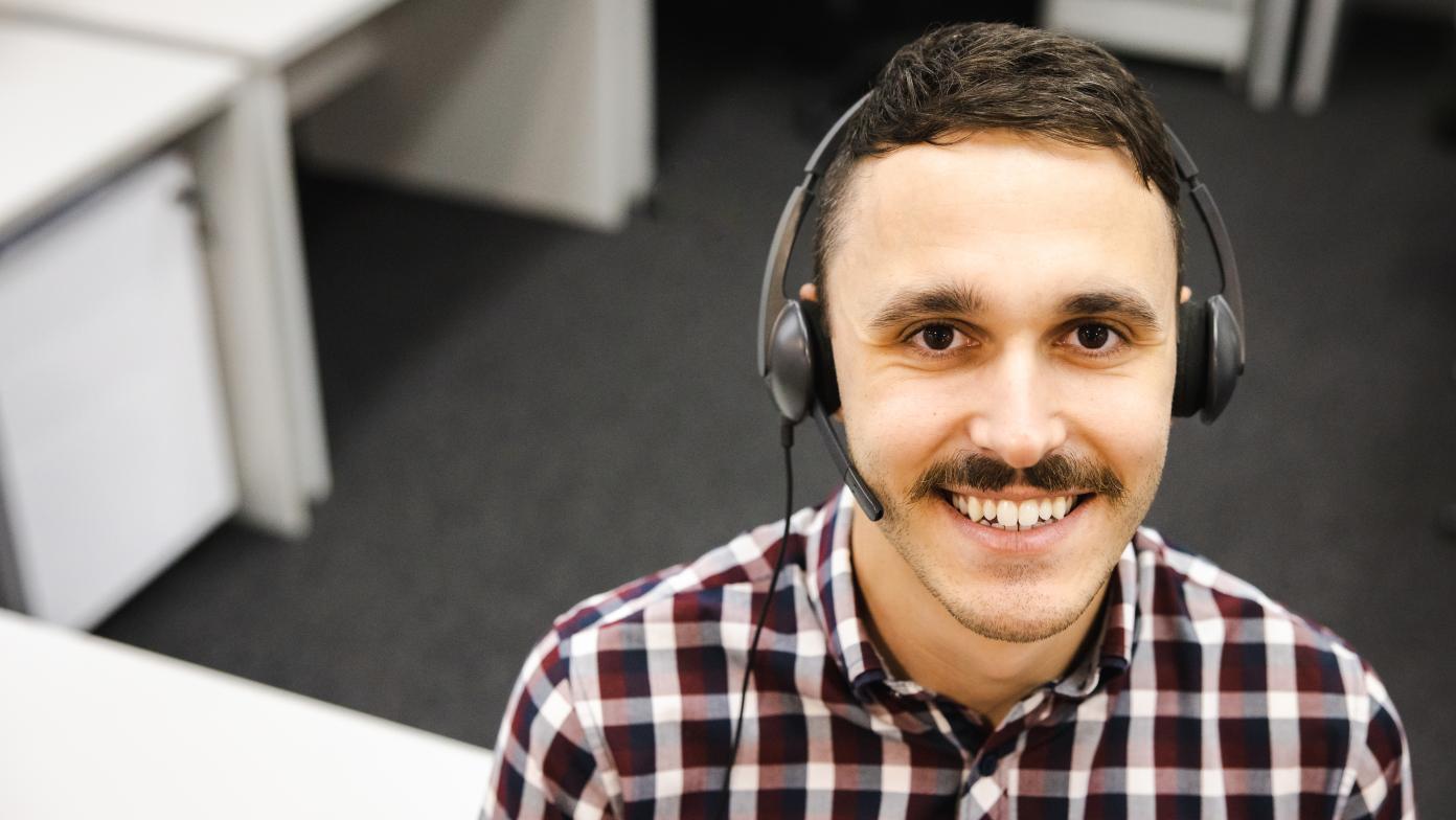 Man smiles at camera