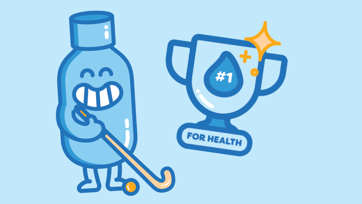 Smiling drink bottle playing hockey next to trophy.