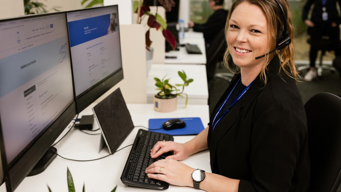 Gippsland Water customer care representative sitting at a desk