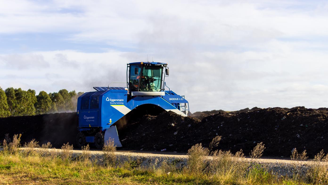 Windrow turner turning a windrow.
