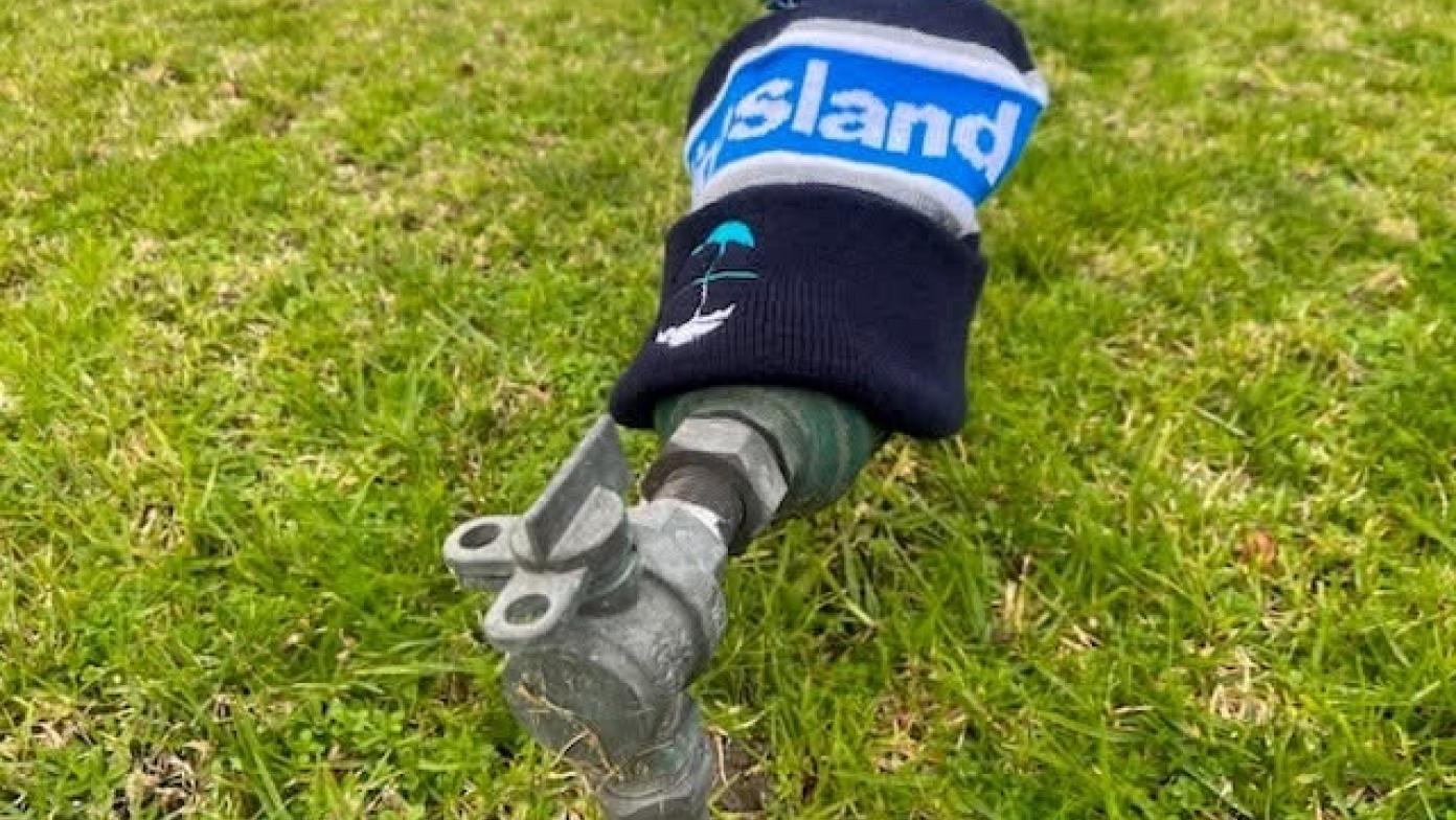 Water meter with beanie covering it