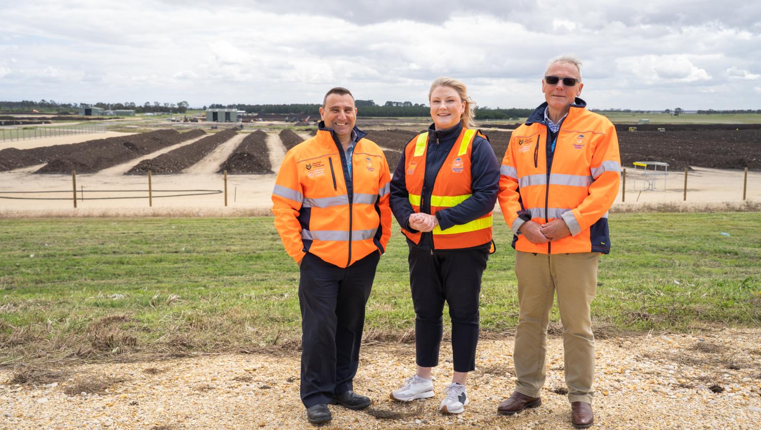 Simon Aquilina, Sarah Cumming and Tom Mollenkopf standing in front of the Gippsland Regional Organics expansion