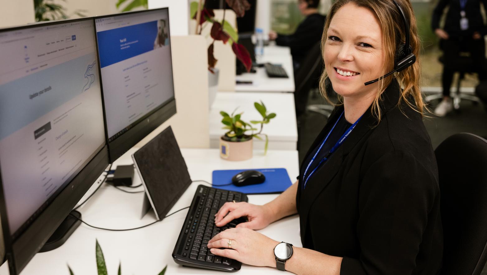 Gippsland Water customer care representative sitting at a desk