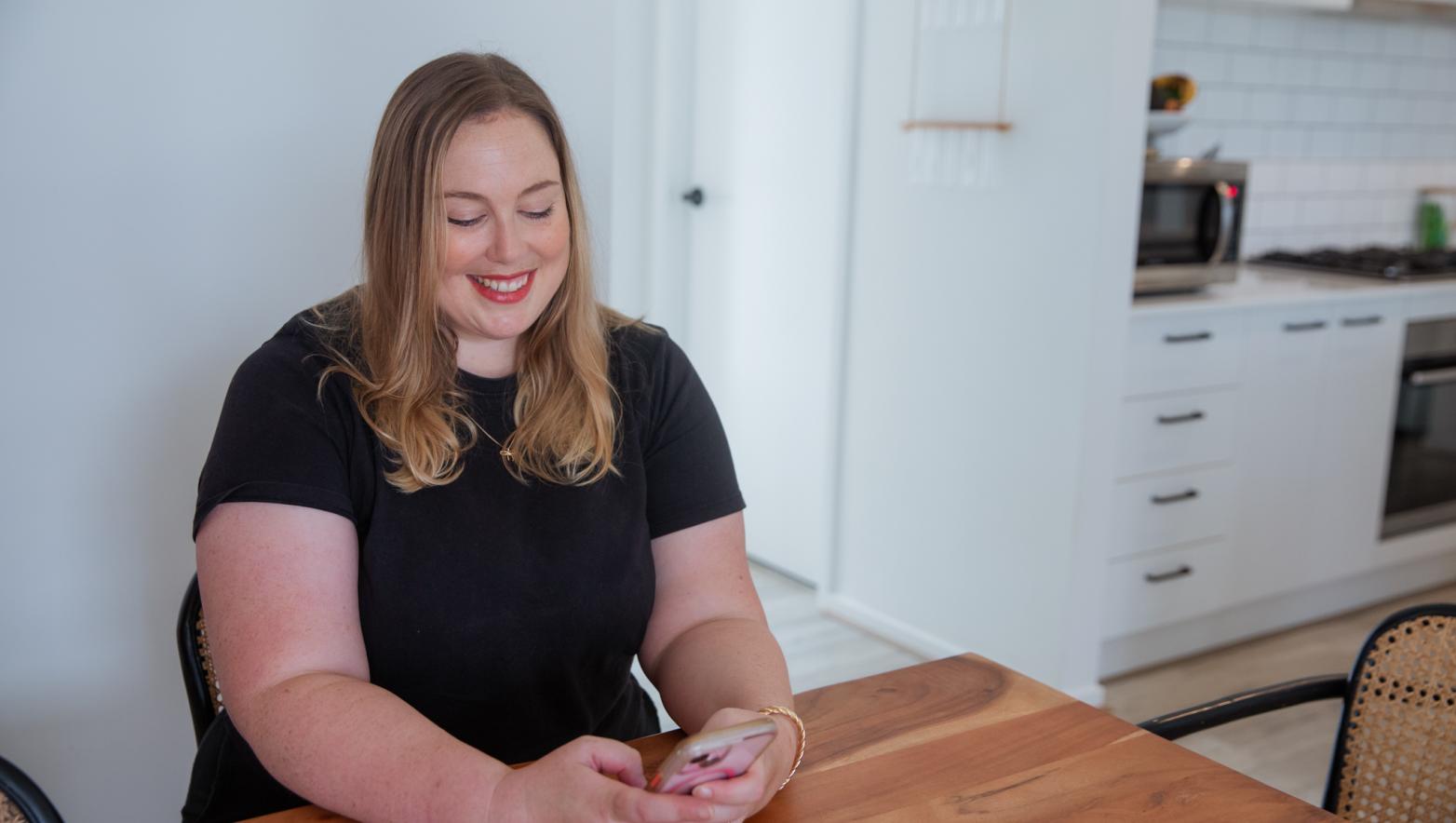 A person looking at a phone screen.