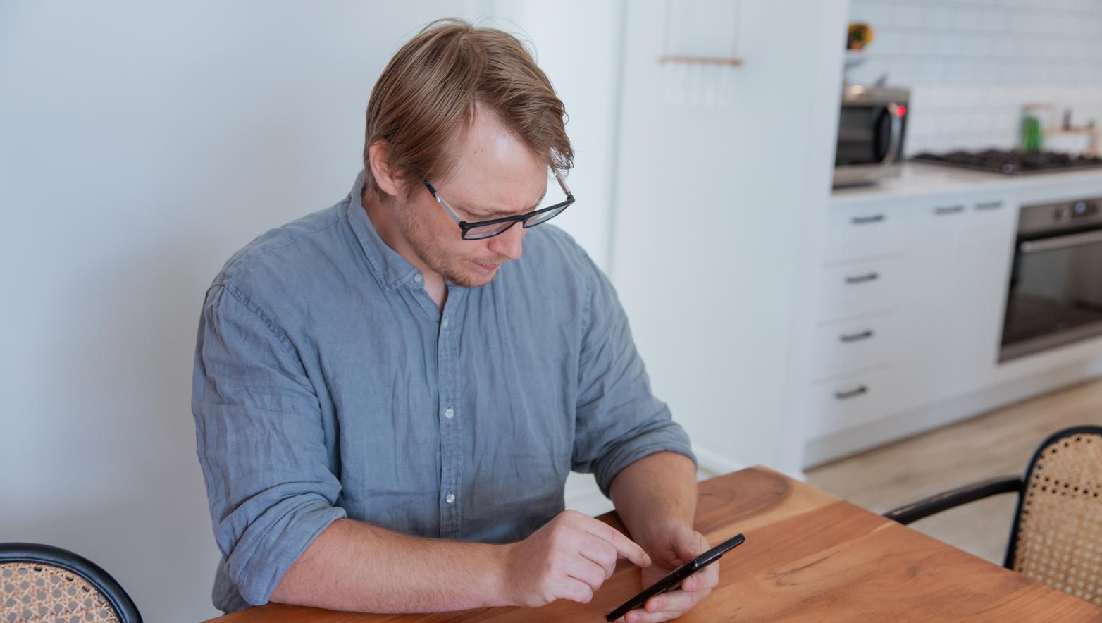 Person looking at mobile phone