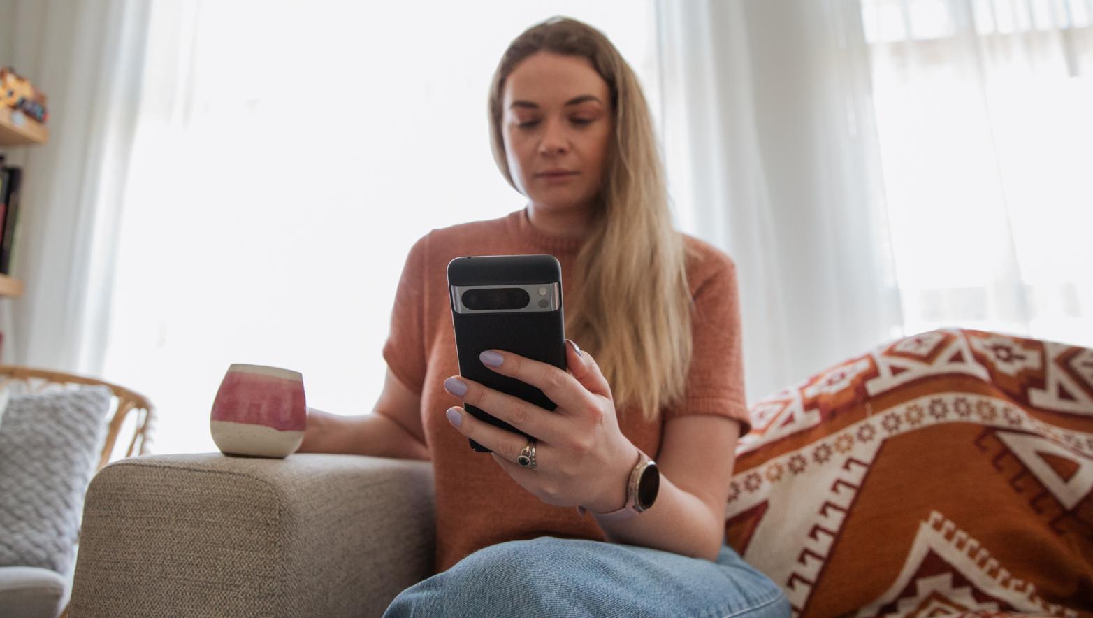 Person texting on mobile phone